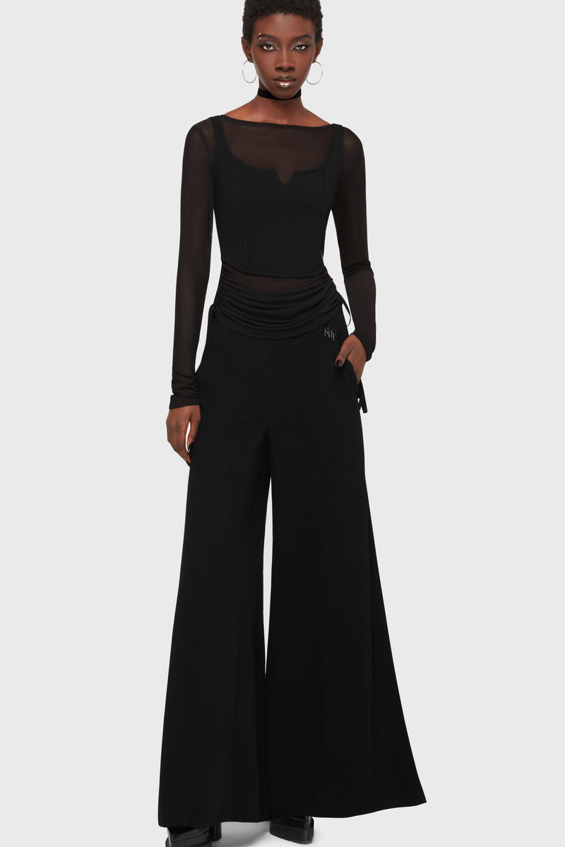 Kihilist Deteriorate women's pants in black showing a full-length front view in alternative gothic style.