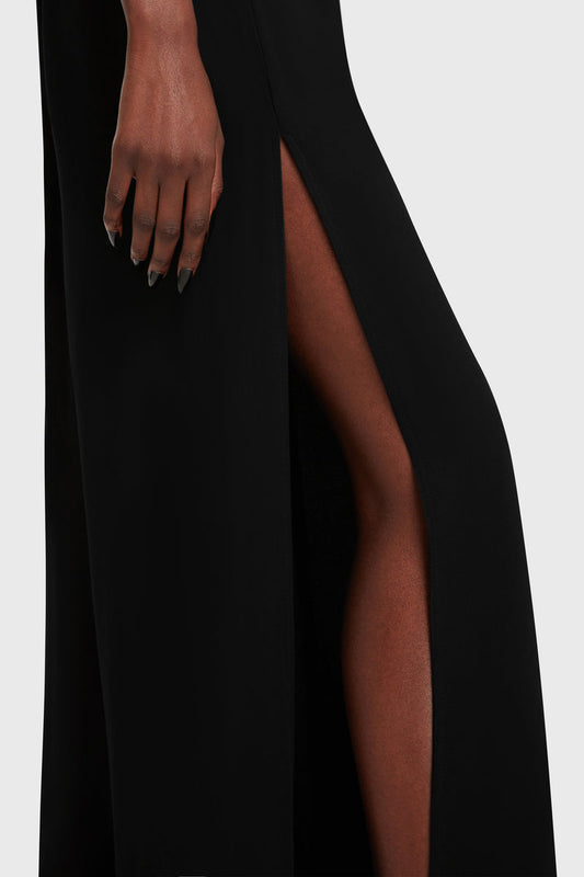 Kihilist Deteriorate women's pants in black showing a side view detail of the high slit.