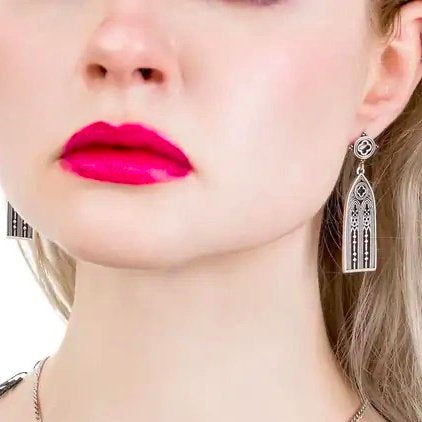 Restyle Altarium gothic earrings in silver color close-up view showing the pointed cathedral hangers.