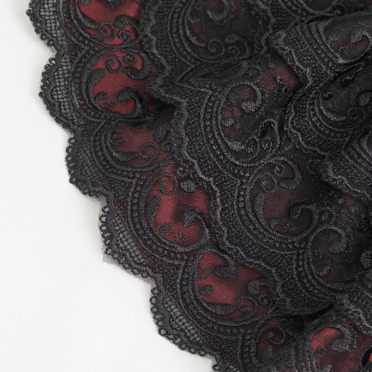 Devil Fashion AS144 burgundy black gothic jabot close-up focusing on the oval metal frame with black stone.
