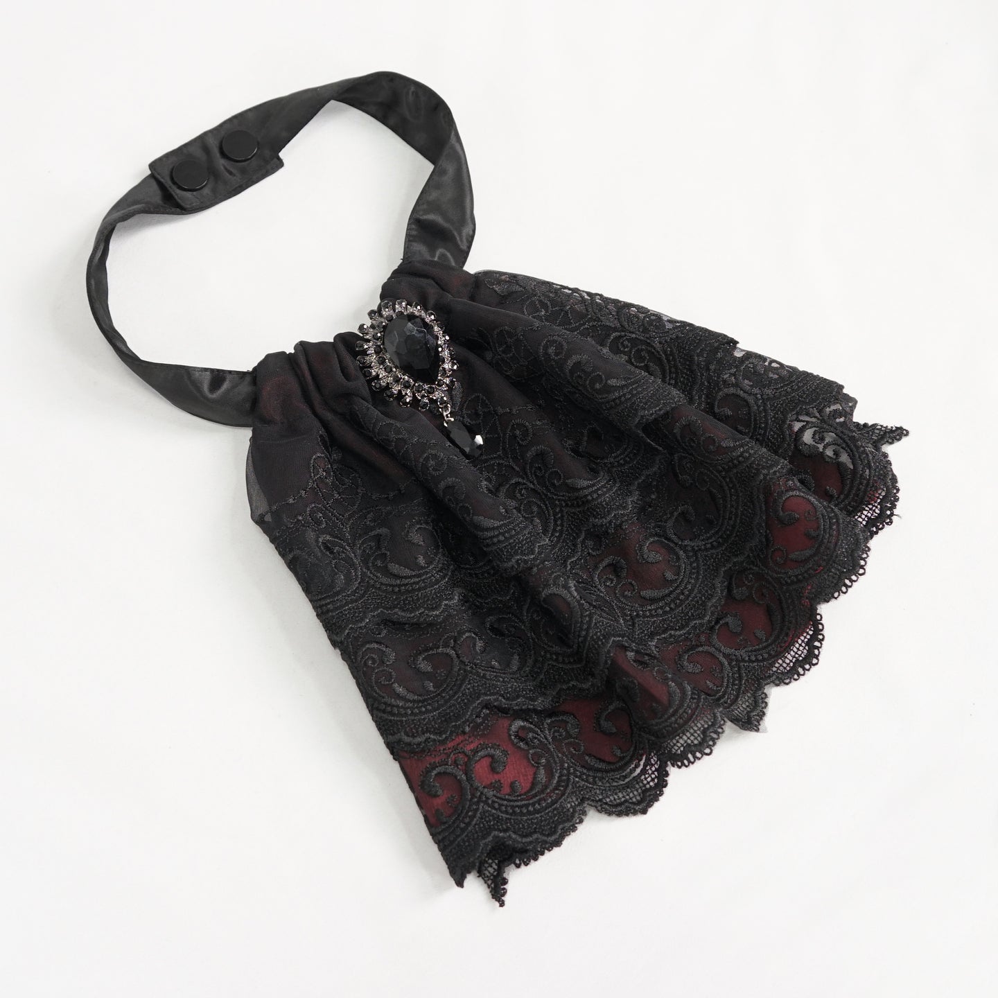 Devil Fashion AS144 burgundy black gothic jabot flat lay view showcasing the satin lining under the lace.