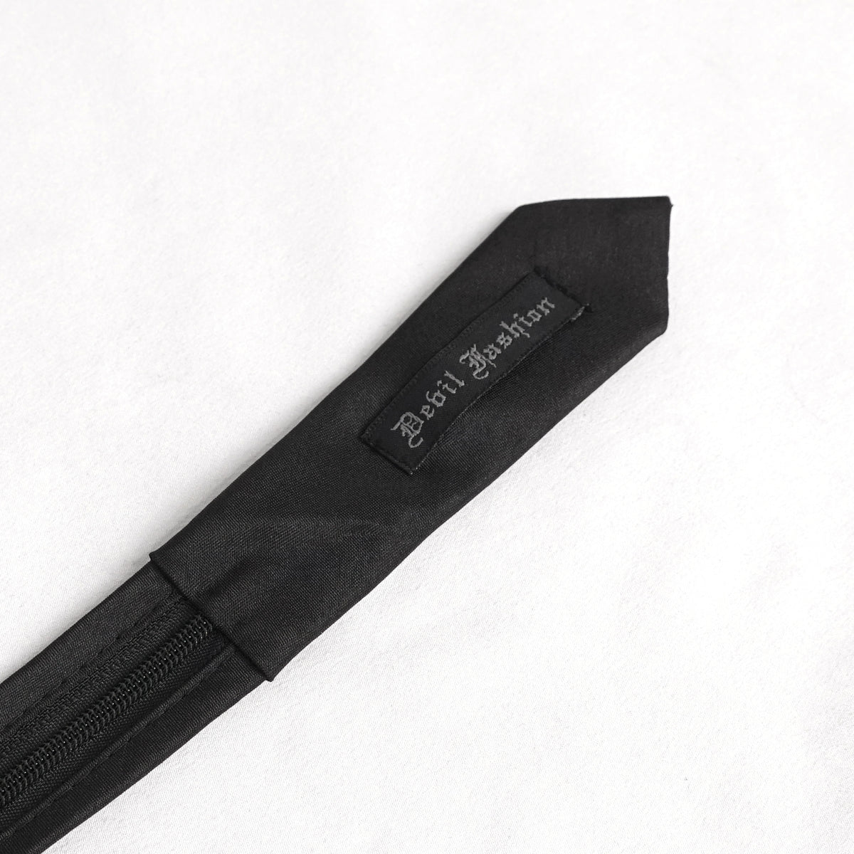Devil Fashion AS157 mens black dark punk tie back view showing the branded fabric lining and product label.
