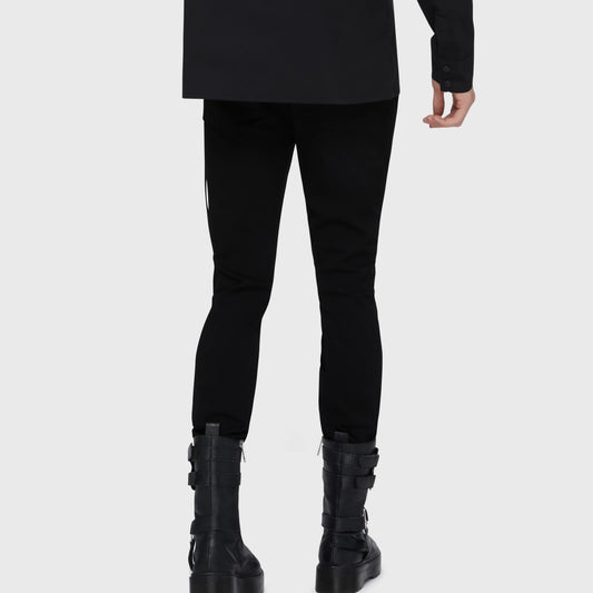 Killstar Kihilist Ebon Bone black gothic jeans back view on a model focusing on the dark denim alternative punk styling.