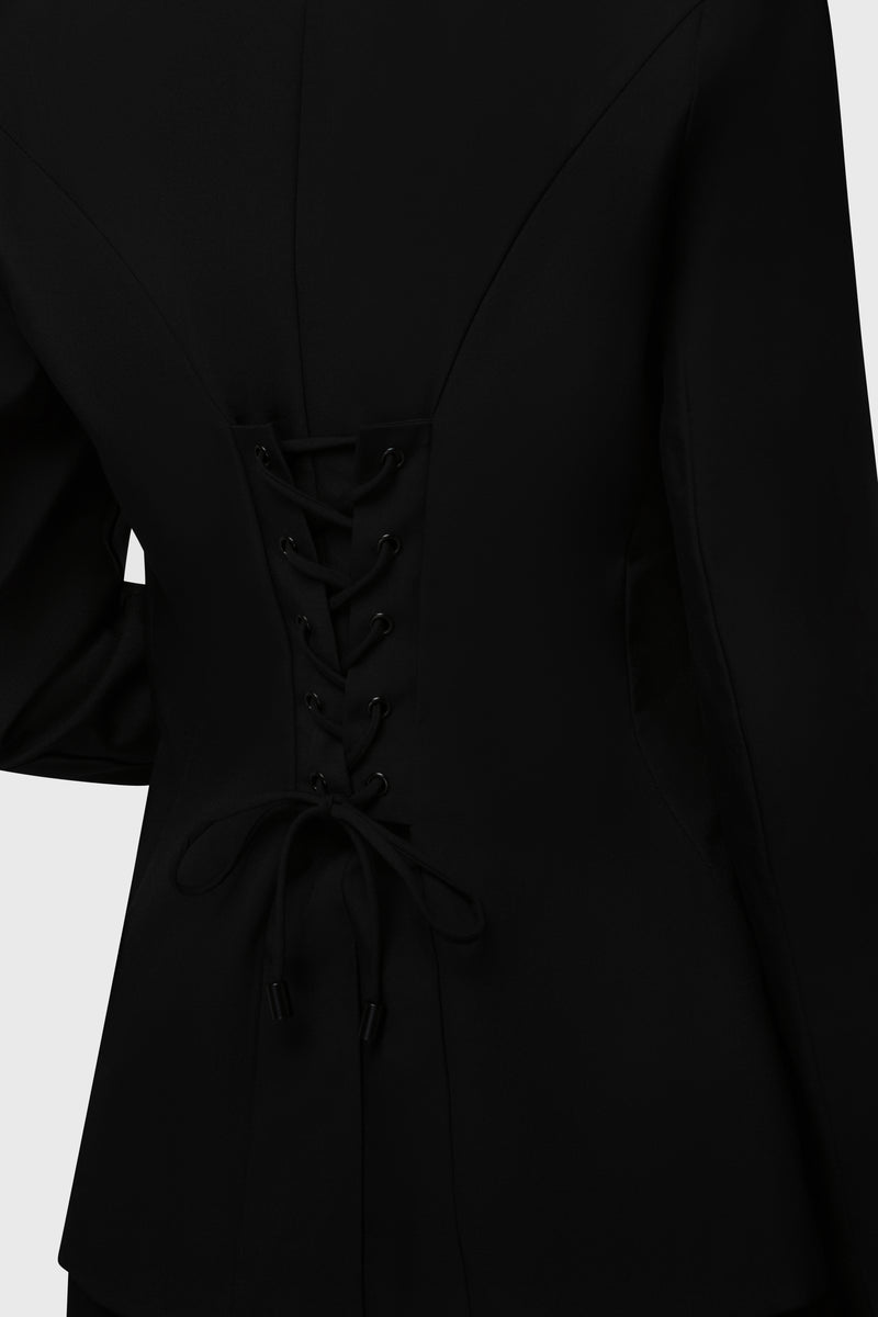 Kihilist Oblivienne gothic style black blazer back detail view showing the lace-up closure with metal grommets.
