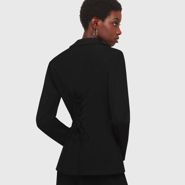 Kihilist Oblivienne alternative goth black blazer showing a back view with a waist lace-up detail.