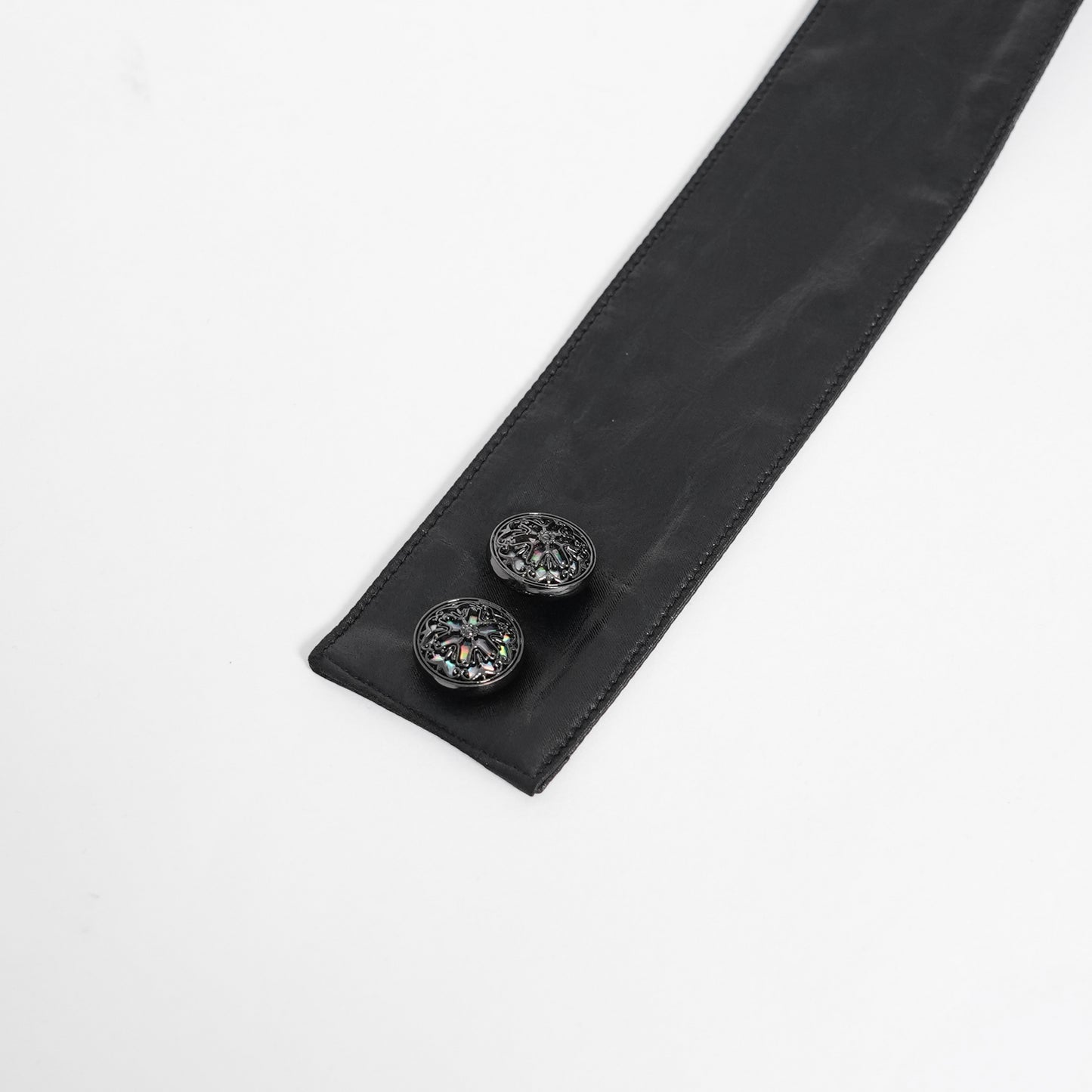 Devil Fashion SHT132 black gothic shirt close-up view with two jabot fastening buttons.