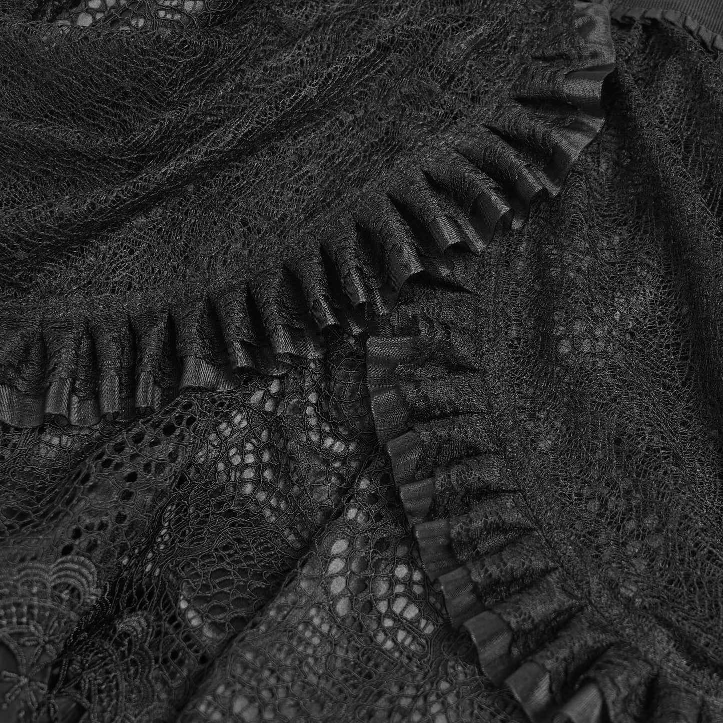 Devil Fashion SKT23901 black gothic skirt close-up view highlighting the asymmetric pleated lace and ruffled layers.