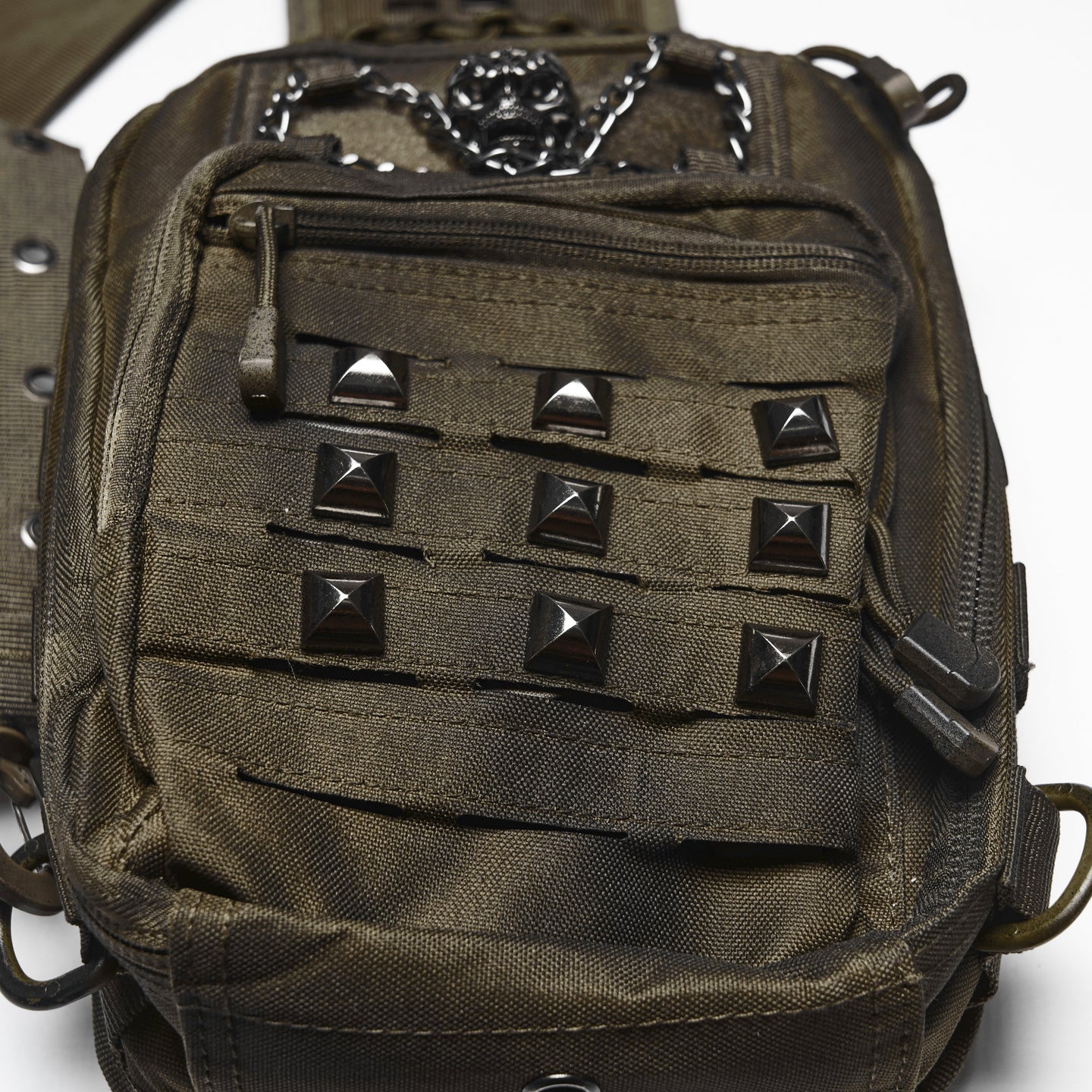 Punk Rave WS-925 khaki brown bag close-up showing the cyberpunk metal studs and zipper pocket detail.